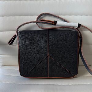 Elegant Black Leather Tusk Crossbody Bag